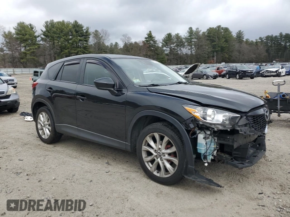 2014 Mazda CX-5 Grand Touring with VIN JM3KE4DY5E0392571, listed as a Copart auction lot 51044335 with 141,334 mi miles and Clean Title. Bid and sale history available at carsss.com. Image 4.