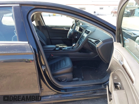 2014 Ford Fusion SE with VIN 1FA6P0HDXE5370384, listed as a IAAI auction lot 41973412 with 147,459 mi miles and . Bid and sale history available at DreamBid. Image 5.