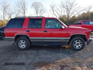 1999 GMC Yukon with VIN 1GKEK13R9XJ748190, listed as a IAAI auction lot 41317890 with 330,490 mi miles. Bid and sale history available at carsss.com. Image 14.