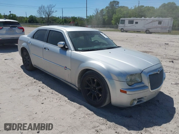 2007 Chrysler 300 C with VIN 2C3KA63H17H849672, listed as a IAAI auction lot 41800769 with 249,457 mi miles and . Bid and sale history available at carsss.com. Image 1.