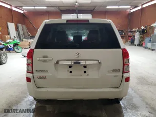 2012 Suzuki Grand Vitara Premium with VIN JS3TD0D66C4100845, listed as a Copart auction lot 53454565 with 106,415 mi miles and Salvage Title. Bid and sale history available at carsss.com. Image 6.