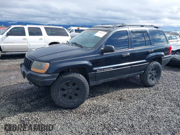 2001 Jeep Grand Cherokee Laredo with VIN 1J4GW48N61C642351, listed as a IAAI auction lot 41783127 with 194,578 mi miles and . Bid and sale history available at DreamBid. Image 2.