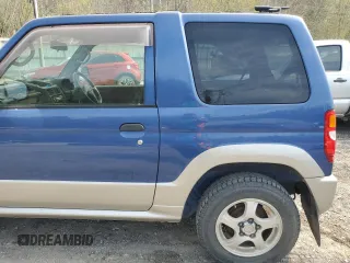 1999 Mitsubishi Montero z VIN H58A0013724, wystawiony jako Copart lot #52986435 z przebiegiem 88 711 mil mil oraz Szkoda całkowita • Salvage title. Historia ofert i sprzedaży dostępna na DreamBid. Obrazek 11.