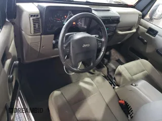 2004 Jeep Wrangler Sahara with VIN 1J4FA59S14P770952, listed as a Copart auction lot 66498694 with 112,649 mi miles and Salvage Title. Bid and sale history available at carsss.com. Image 8.