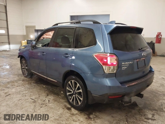 2017 Subaru Forester Touring with VIN JF2SJGTC9HH410251, listed as a IAAI auction lot 41411079 with 131,220 mi miles and . Bid and sale history available at DreamBid. Image 3.