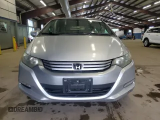 2010 Honda Insight LX z VIN JHMZE2H5XAS018546, wystawiony jako Copart lot #61411545 z przebiegiem 55 814 mil mil oraz Czysty tytuł • Clean title. Historia ofert i sprzedaży dostępna na DreamBid. Obrazek 5.