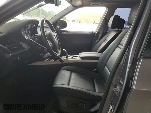 2012 BMW X5 35i with VIN 5UXZV4C56CL889802, listed as a Copart auction lot 62302265 with Not provided miles and Clean title. Bid and sale history available at DreamBid. Image 7.