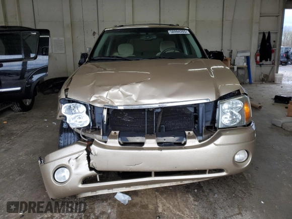 2006 GMC Envoy SLE with VIN 1GKDT13S662304673, listed as a Copart auction lot 50994265 with 221,069 mi miles and Salvage Title. Bid and sale history available at carsss.com. Image 5.