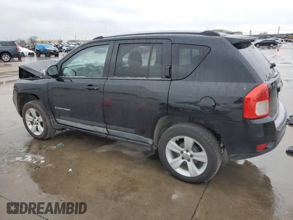 2011 Jeep Compass with VIN 1J4NT1FAXBD138041, listed as a Copart auction lot 87870855 with 184,549 mi miles and Clean Title. Bid and sale history available at carsss.com. Image 2.