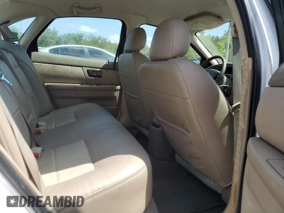 2006 Ford Taurus SEL z VIN 1FAFP56U46A209165, wystawiony jako Copart lot #56004955 z przebiegiem 52 057 mil mil oraz Czysty tytuł • Clean title. Historia ofert i sprzedaży dostępna na DreamBid. Obrazek 10.