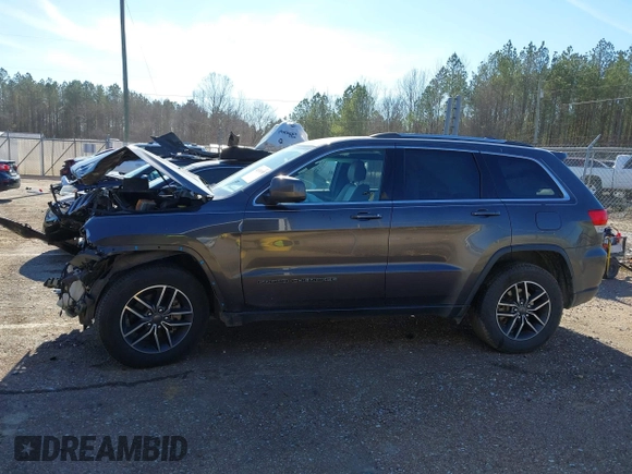 2019 Jeep Grand Cherokee Altitude with VIN 1C4RJEAG3KC534057, listed as a IAAI auction lot 41330391 with 125,175 mi miles and . Bid and sale history available at DreamBid. Image 14.