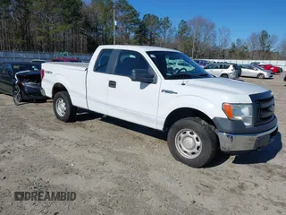 2014 Ford F-150 XL with VIN 1FTFX1EF0EKF01068, listed as a IAAI auction lot 41641910 with 212,728 mi miles. Bid and sale history available at carsss.com. Image 1.