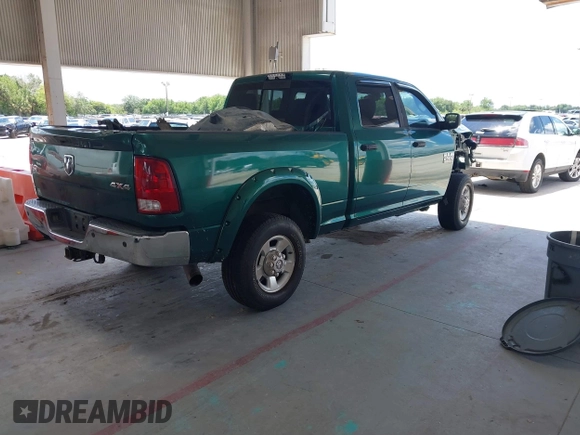 2014 Ram 2500 Big Horn with VIN 3C6UR5DLXEG150779, listed as a IAAI auction lot 42254622 with 199,510 mi miles and . Bid and sale history available at DreamBid. Image 4.