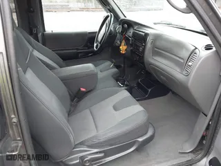 2005 Mazda B-Series 4WD Truck SE with VIN 4F4ZR47E15PM05750, listed as a IAAI auction lot 41850056 with 163,605 mi miles. Bid and sale history available at carsss.com. Image 5.