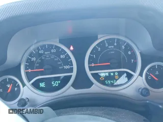 2008 Jeep Wrangler Unlimited Sahara с VIN 1J4GA59118L594851, выставлен на аукционе IAAI как лот 41643490 с пробегом 59 421 миль миль и . История ставок и продаж доступна на DreamBid. Изображение 7.