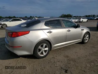 2014 Kia Optima LX with VIN 5XXGM4A77EG318466, listed as a Copart auction lot 65451805 with 196,970 mi miles and Clean title. Bid and sale history available at DreamBid. Image 3.