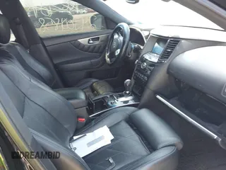 2015 Infiniti QX70 с VIN JN8CS1MWXFM481585, выставлен на аукционе IAAI как лот 42102964 с пробегом Не указан миль и . История ставок и продаж доступна на DreamBid. Изображение 5.