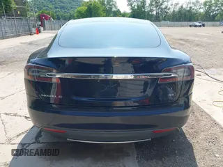 2014 Tesla Model S 60 with VIN 5YJSA1H17EFP65983, listed as a IAAI auction lot 42399288 with 166,365 mi miles and . Bid and sale history available at DreamBid. Image 17.