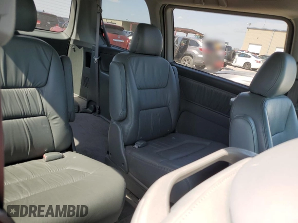 2004 Honda Odyssey EX-L with VIN 5FNRL18974B092979, listed as a Copart auction lot 52429055 with 106,515 mi miles and Clean Title. Bid and sale history available at DreamBid. Image 11.