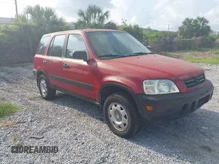 1999 Honda CR-V LX z VIN JHLRD1846XC070087, wystawiony jako IAAI lot #42321054 z przebiegiem 249 696 mil mil oraz . Historia ofert i sprzedaży dostępna na DreamBid. Obrazek 1.