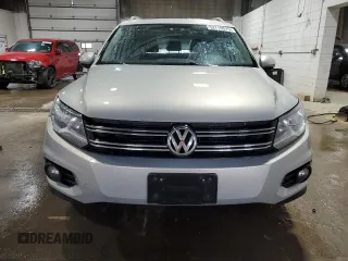 2013 Volkswagen Tiguan SE z VIN WVGBV3AX1DW579506, wystawiony jako Copart lot #52719575 z przebiegiem 163 471 mil mil oraz Szkoda całkowita • Salvage title. Historia ofert i sprzedaży dostępna na DreamBid. Obrazek 5.