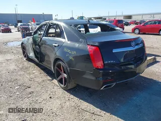 2014 Cadillac CTS AWD z VIN 1G6AW5SX6E0197020, wystawiony jako IAAI lot #41228636 z przebiegiem Nie podano mil oraz . Historia ofert i sprzedaży dostępna na DreamBid. Obrazek 3.