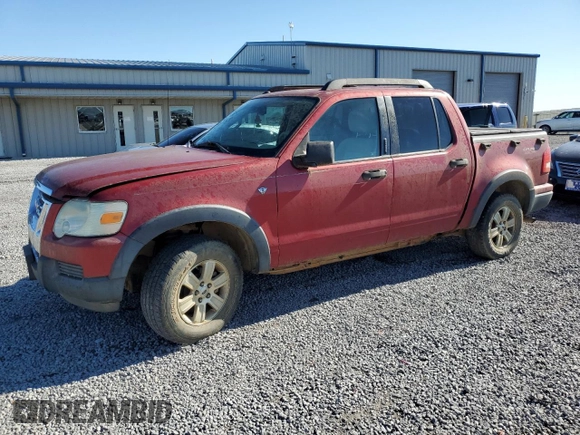 2007 Ford Explorer Sport Trac XLT with VIN 1FMEU51887UA09474, listed as a Copart auction lot 57625115 with 128,443 mi miles and Salvage title. Bid and sale history available at DreamBid. Image 1.