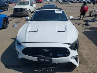 2020 Ford Mustang EcoBoost z VIN 1FATP8UH0L5105965, wystawiony jako IAAI lot #42475841 z przebiegiem 68 999 mil mil oraz . Historia ofert i sprzedaży dostępna na DreamBid. Obrazek 13.