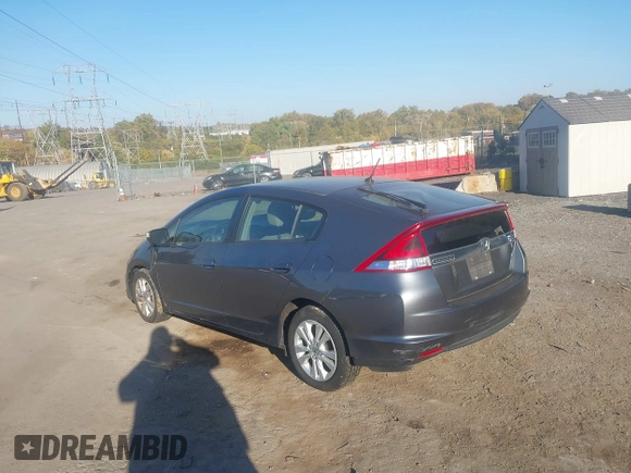 2012 Honda Insight EX z VIN JHMZE2H70CS004787, wystawiony jako IAAI lot #40668475 z przebiegiem 127 599 mil mil oraz . Historia ofert i sprzedaży dostępna na DreamBid. Obrazek 3.