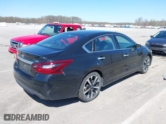 2018 Nissan Altima SV with VIN 1N4AL3AP5JC285843, listed as a IAAI auction lot 41956374 with 100,688 mi miles and . Bid and sale history available at carsss.com. Image 4.
