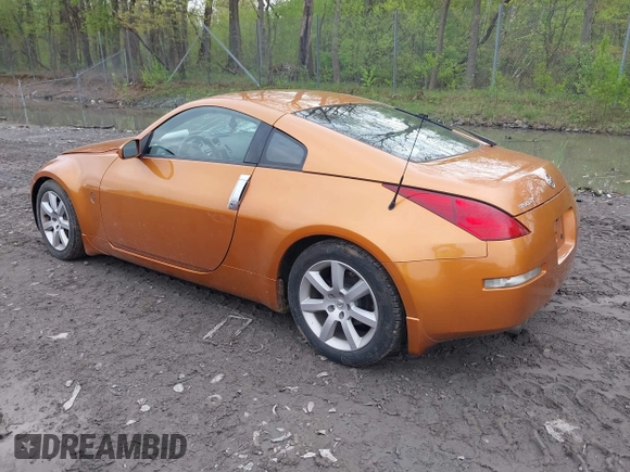 2003 Nissan 350Z Touring z VIN JN1AZ34E73T003839, wystawiony jako IAAI lot #42206083 z przebiegiem 50 919 mil mil oraz . Historia ofert i sprzedaży dostępna na DreamBid. Obrazek 3.
