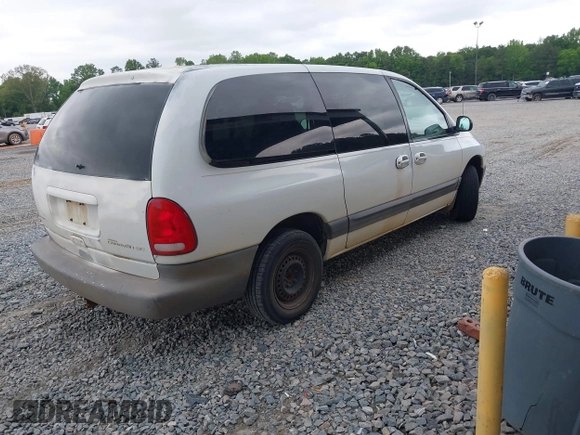 1999 Dodge Caravan SE with VIN 1B4GP44G1XB894210, listed as a IAAI auction lot 42122444 with 352,473 mi miles and . Bid and sale history available at carsss.com. Image 4.