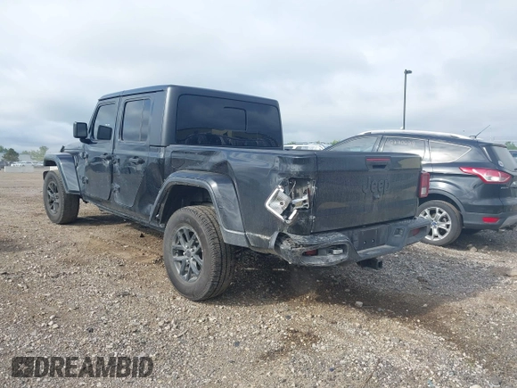 2022 Jeep Gladiator Texas Trail with VIN 1C6HJTAG7NL125006, listed as a IAAI auction lot 42288180 with 96,694 mi miles and . Bid and sale history available at DreamBid. Image 3.