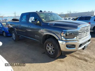 2021 Ram 2500 Laramie z VIN 3C6UR5FL7MG629012, wystawiony jako IAAI lot #41369353 z przebiegiem 168 099 mil mil oraz . Historia ofert i sprzedaży dostępna na DreamBid. Obrazek 1.