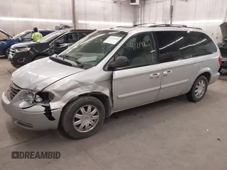 2007 Chrysler Town & Country LWB Touring with VIN 2A4GP54L87R151822, listed as a IAAI auction lot 41214165 with 207,349 mi miles. Bid and sale history available at carsss.com. Image 2.