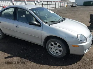 2005 Dodge Neon SXT with VIN 1B3ES56C75D273890, listed as a IAAI auction lot 42149159 with 212,741 mi miles. Bid and sale history available at carsss.com. Image 1.