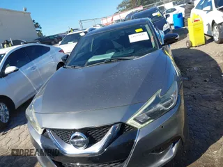 2018 Nissan Maxima SL z VIN 1N4AA6AP2JC387155, wystawiony jako IAAI lot #41642025 z przebiegiem 125 621 mil mil oraz . Historia ofert i sprzedaży dostępna na DreamBid. Obrazek 12.