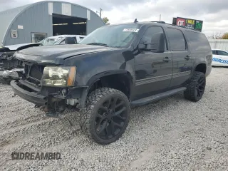 2009 Chevrolet Suburban LT w/2LT with VIN 1GNFK263X9R278809, listed as a Copart auction lot 77856924 with 139,744 mi miles and Salvage Title. Bid and sale history available at carsss.com. Image 1.