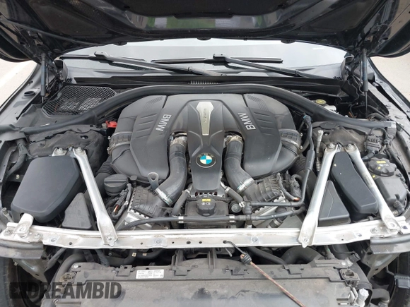 2019 BMW 7 Series 750i with VIN WBA7F0C50KGM26010, listed as a IAAI auction lot 42188421 with 71,576 mi miles and . Bid and sale history available at DreamBid. Image 10.
