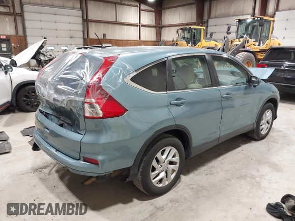 2015 Honda CR-V EX with VIN 2HKRM4H57FH614090, listed as a IAAI auction lot 41940788 with 334,805 mi miles and . Bid and sale history available at DreamBid. Image 4.