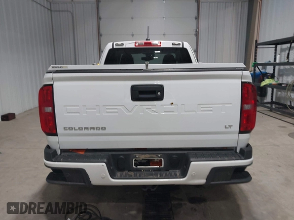 2021 Chevrolet Colorado 4WD LT z VIN 1GCHTCEA0M1242851, wystawiony jako IAAI lot #42131592 z przebiegiem 42 731 mil mil oraz . Historia ofert i sprzedaży dostępna na DreamBid. Obrazek 17.