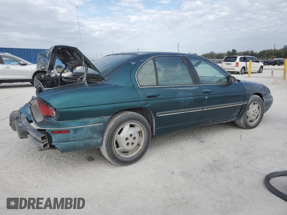 1997 Chevrolet Lumina LS with VIN 2G1WL52M1V9120300, listed as a Copart auction lot 87460394 with 142,588 mi miles and Salvage Title. Bid and sale history available at DreamBid. Image 3.