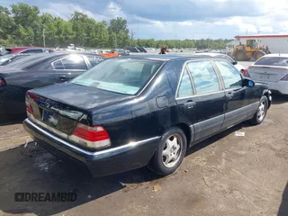 1998 Mercedes-Benz S-Class with VIN WDBGA33G4WA391919, listed as a IAAI auction lot 40139391 with 99,744 mi miles. Bid and sale history available at carsss.com. Image 4.