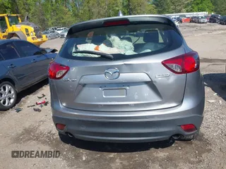2013 Mazda CX-5 Sport z VIN JM3KE2BE9D0132928, wystawiony jako IAAI lot #41997589 z przebiegiem Nie podano mil oraz . Historia ofert i sprzedaży dostępna na DreamBid. Obrazek 15.