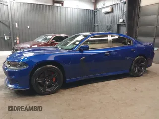 2022 Dodge Charger R/T with VIN 2C3CDXCT9NH127952, listed as a IAAI auction lot 42020401 with 55,483 mi miles and . Bid and sale history available at carsss.com. Image 15.