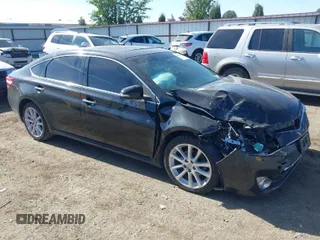 2013 Toyota Avalon XLE with VIN 4T1BK1EB5DU047960, listed as a IAAI auction lot 40474003 with 153,420 mi miles and . Bid and sale history available at carsss.com. Image 1.