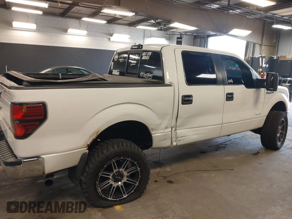 2013 Ford F-150 XL with VIN 1FTFW1ET8DFB48563, listed as a IAAI auction lot 42103243 with 257,778 mi miles. Bid and sale history available at carsss.com. Image 6.