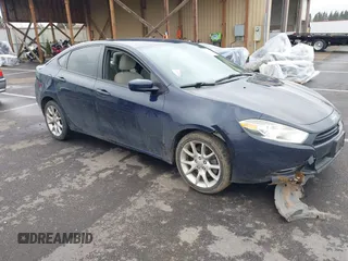 2013 Dodge Dart SXT z VIN 1C3CDFBH4DD142555, wystawiony jako IAAI lot #41857846 z przebiegiem 154 520 mil mil oraz . Historia ofert i sprzedaży dostępna na DreamBid. Obrazek 1.