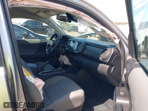2021 Toyota Tacoma SR with VIN 3TYAX5GN2MT028470, listed as a IAAI auction lot 42514362 with 23,171 mi miles and . Bid and sale history available at DreamBid. Image 5.