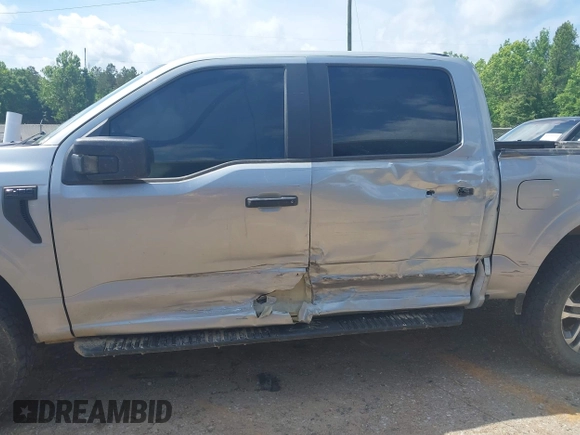 2023 Ford F-150 XL with VIN 1FTFW1E55PKE96110, listed as a IAAI auction lot 42127827 with 35,741 mi miles and . Bid and sale history available at DreamBid. Image 6.